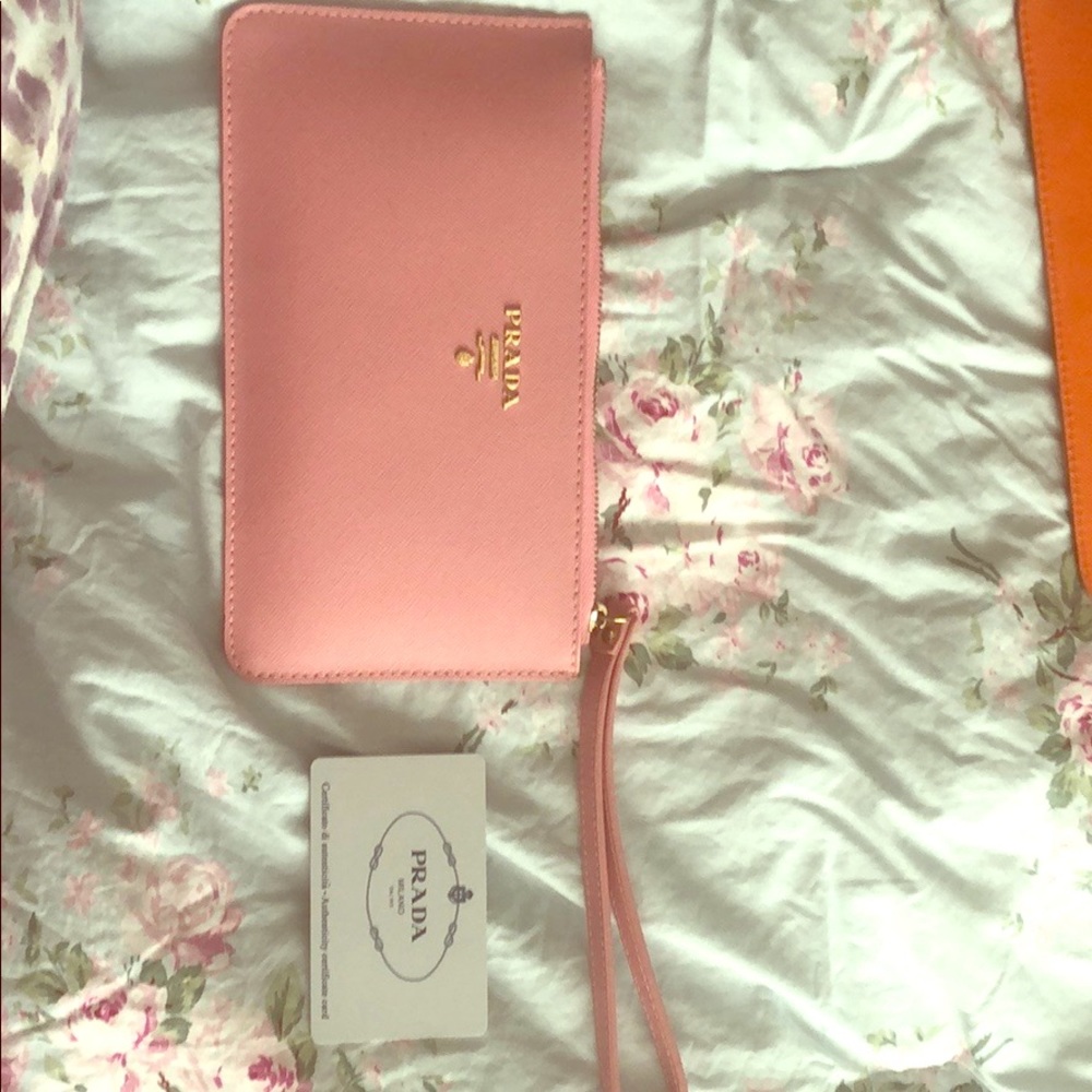 Two Prada wristlets. One pink one orange NWT